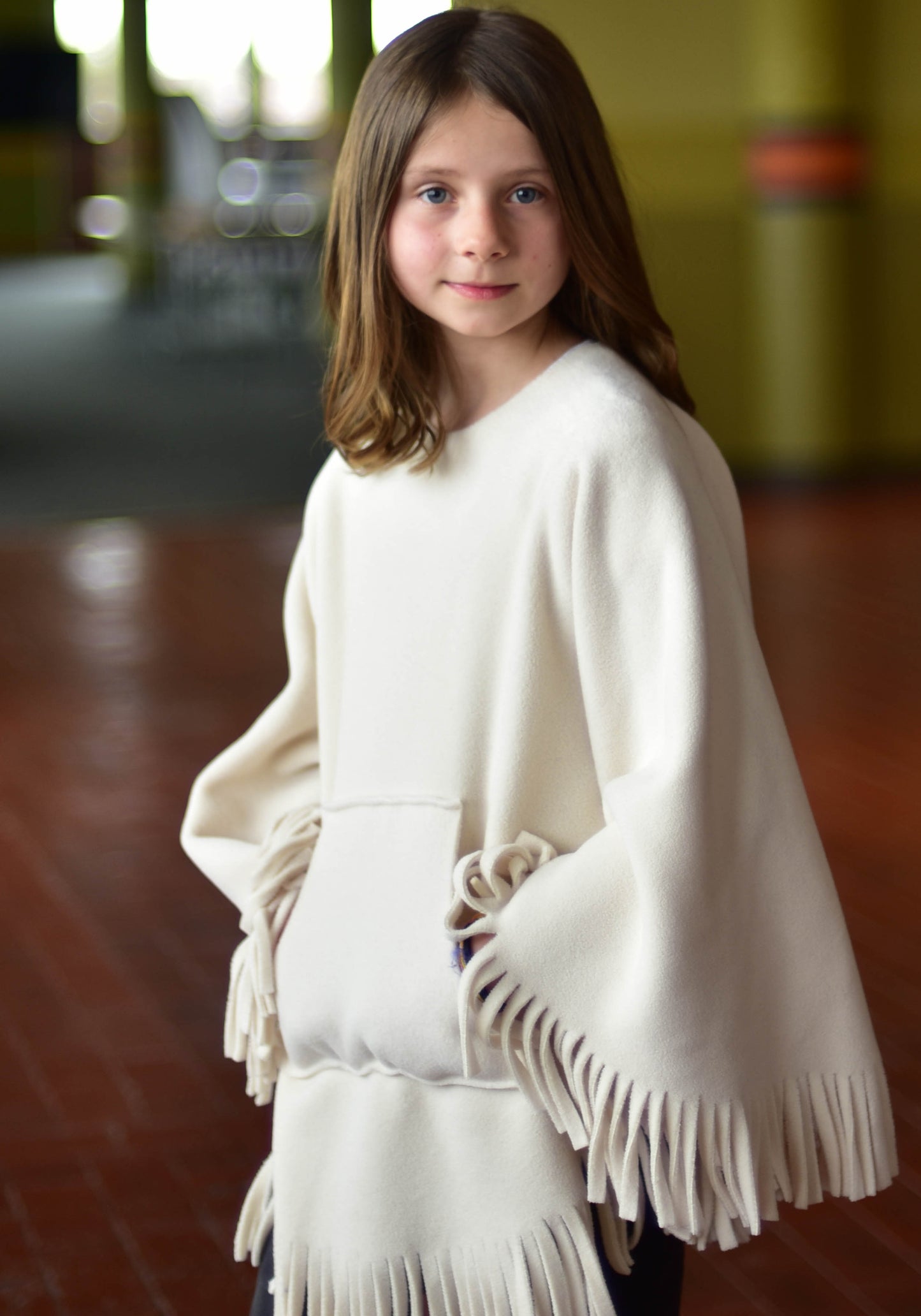 Kique: The Kids' Fringed Kique with Pocket
